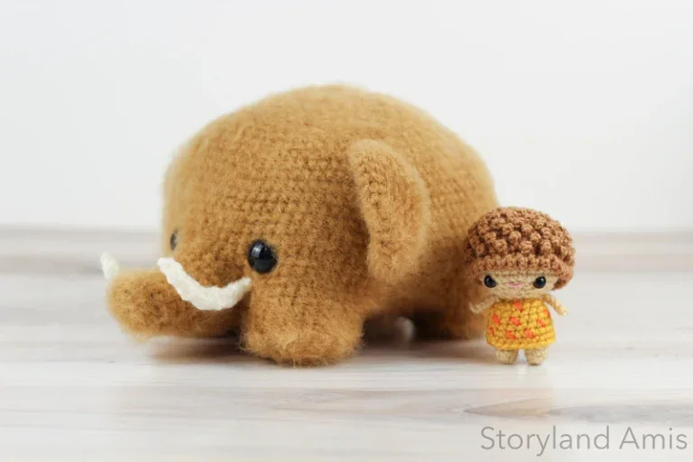 Amigurumi woolly mammoth and cave boy