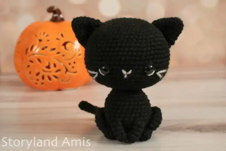 A black amigurumi cat