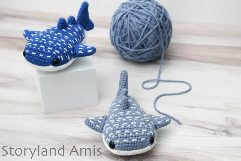 Two amigurumi whale sharks.