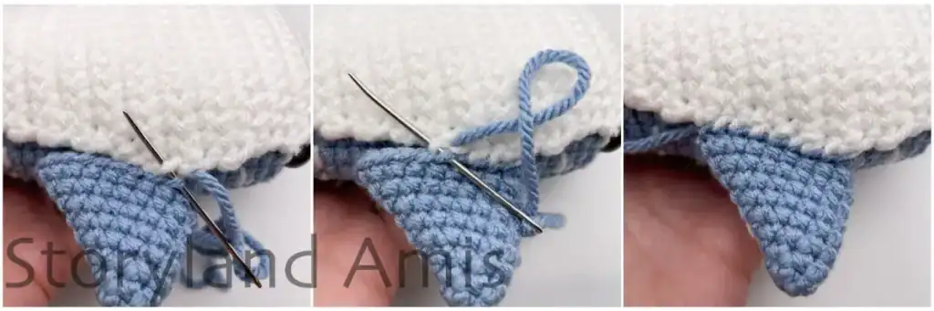 A hand demonstrates how to sew the fins to the body of an amigurumi whale shark.