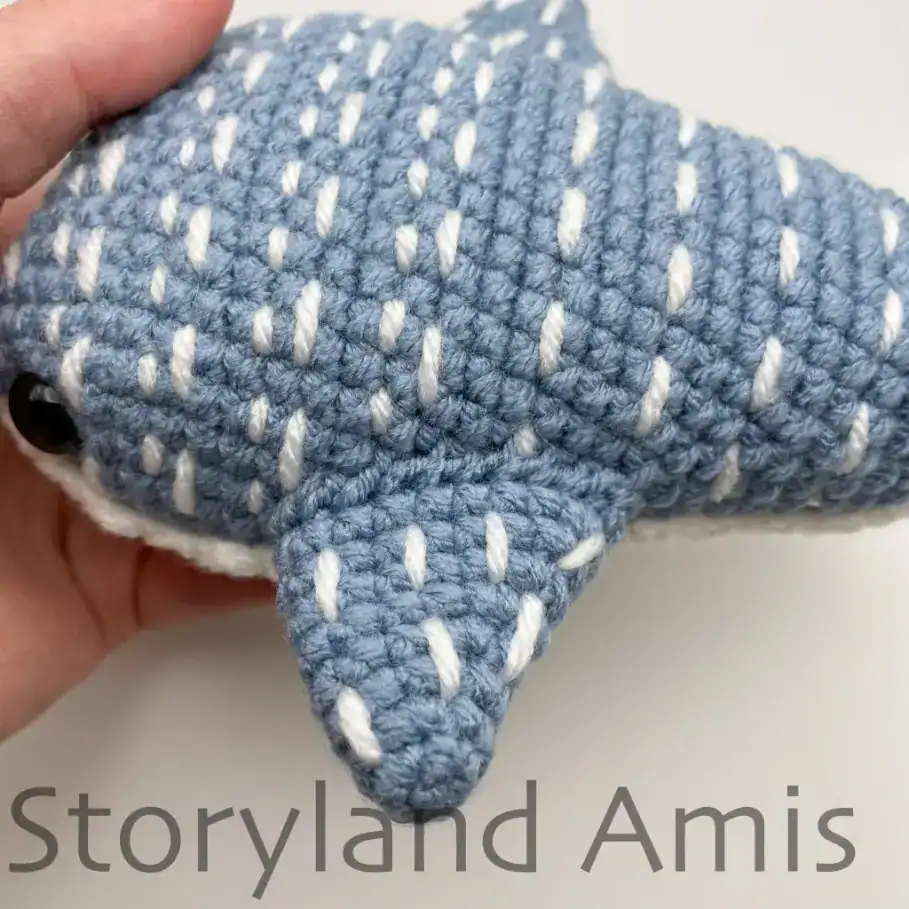A crocheted whale shark fin.
