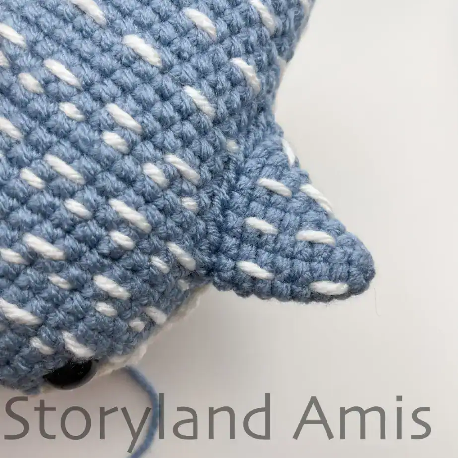 A crocheted whale shark fin.