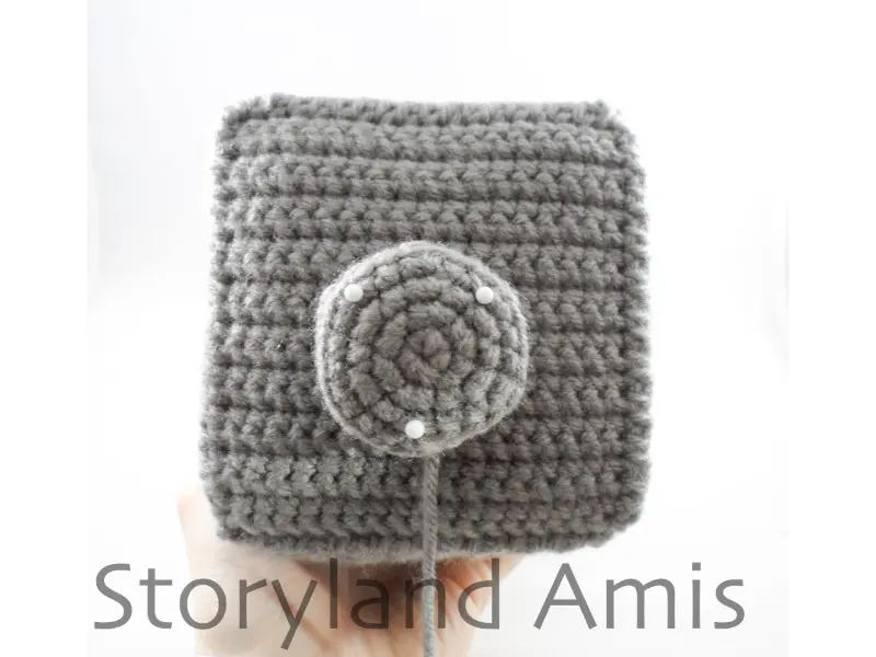 The side of an amigurumi robot head.
