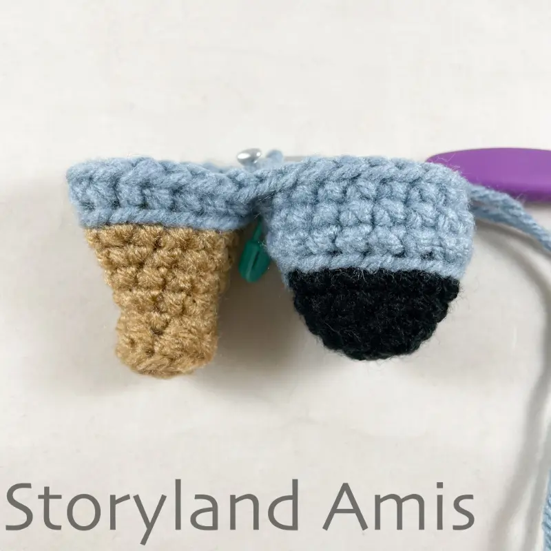 A partially finished amigurumi pirate doll body.