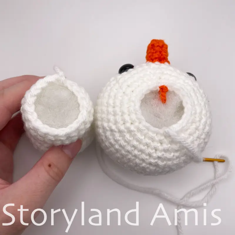 An amigurumi snowman's body and head are shown side by side from the top.
