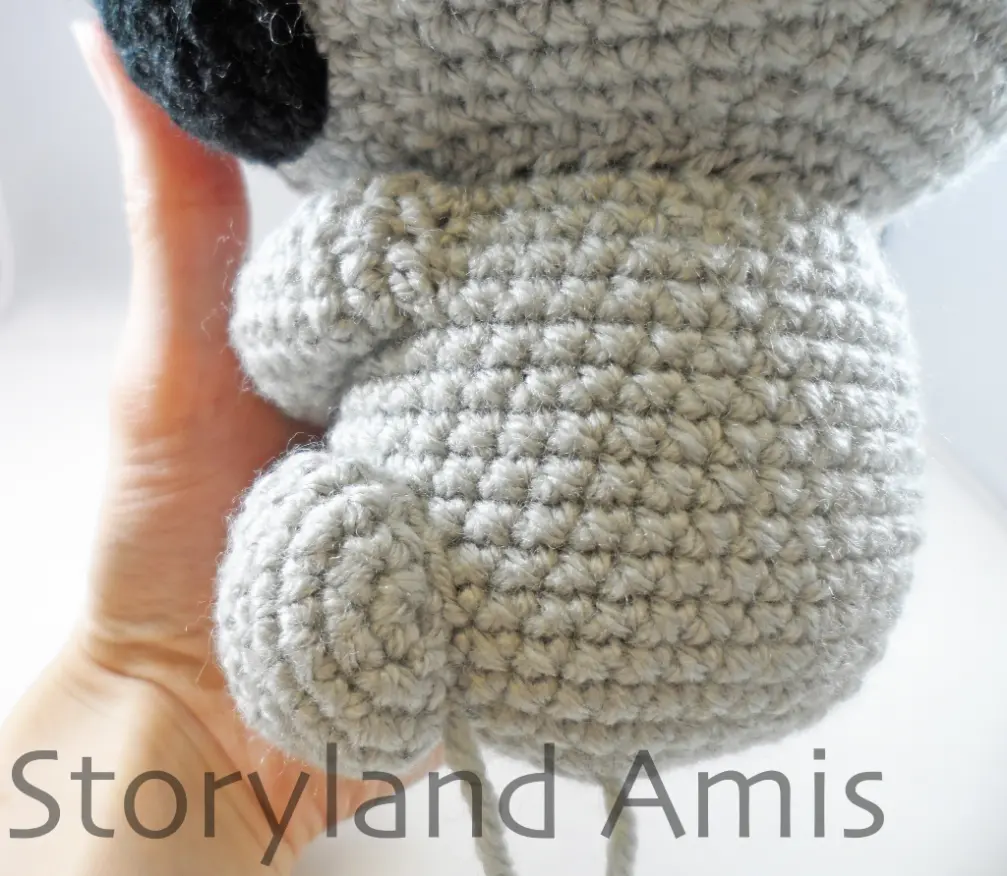 A close-up of the back of an amigurumi koala's body.