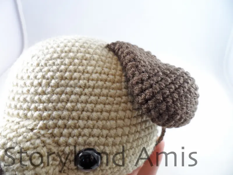 A close-up of an amigurumi dog's ear.