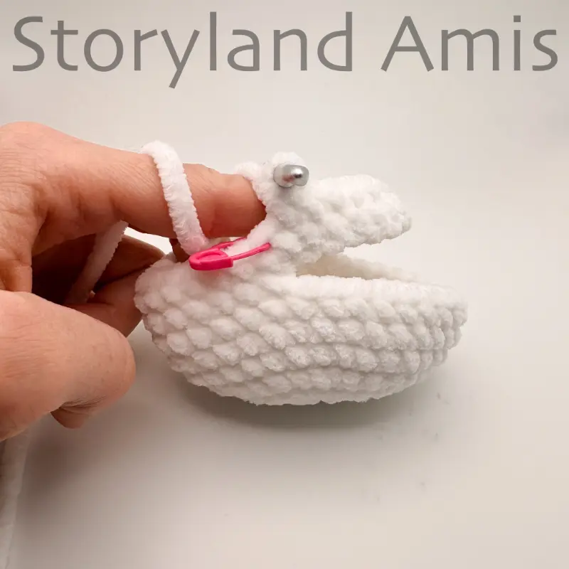 A partially crocheted unicorn head.